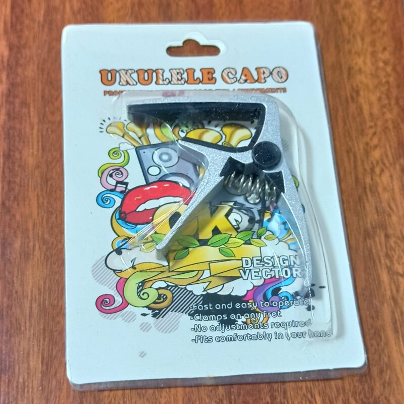 Capotraste Transportador Ukelele, Generico