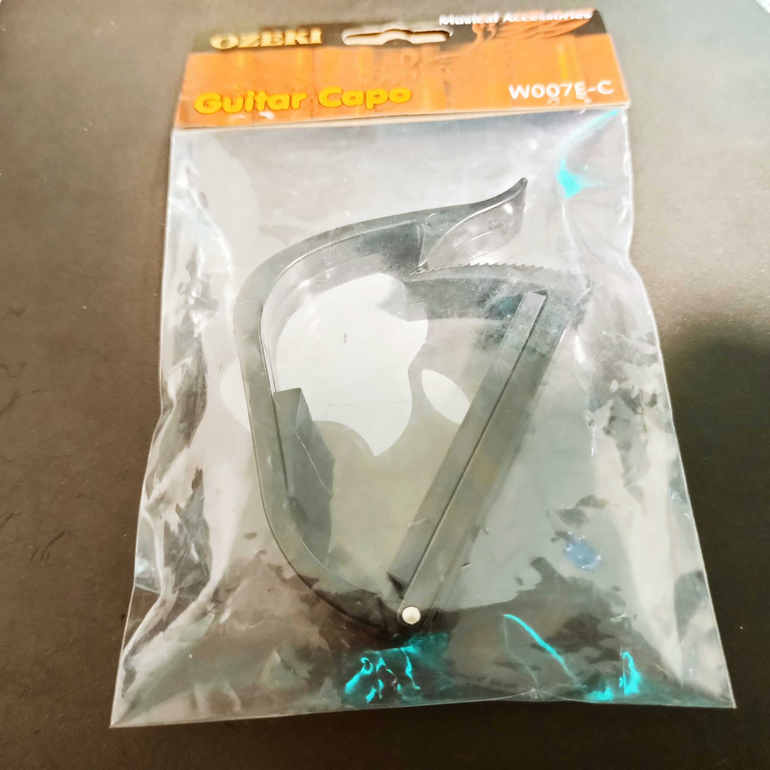 Capotraste Transportador Cremallera Ozeki W007E-C Guitarra